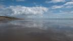 Pendine Sands at low tide after a heavy rain shower