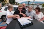 Checking the route by the Lake Garda shore