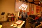 President Allan Fabry and Twin Cam owner Ken Johns cut the cake